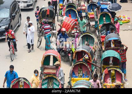 Dhaka, Bangladesh. 31st May, 2022. Rickshaw pullers seen waiting for customers on the streets of Dhaka. Credit: SOPA Images Limited/Alamy Live News Stock Photo