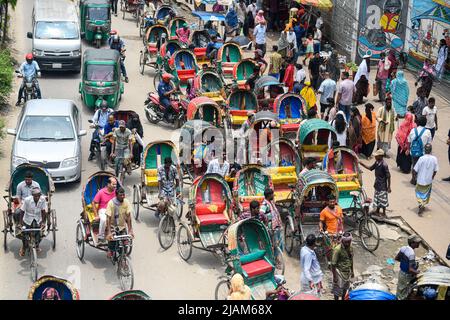 Dhaka, Bangladesh. 31st May, 2022. Rickshaw pullers seen waiting for customers on the streets of Dhaka. Credit: SOPA Images Limited/Alamy Live News Stock Photo