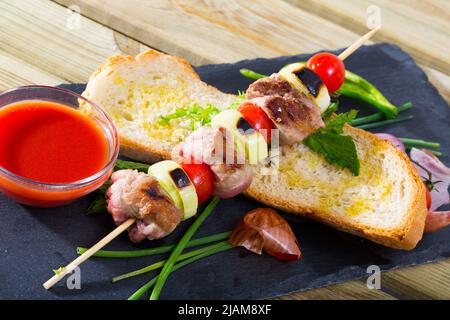Mutton slices on barbecue skewers Stock Photo