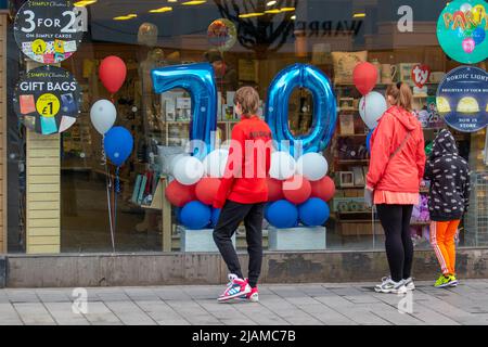 Platinum Jubilee Southport, Merseyside.  Uk Weather.  31 May 2022. Shops, shoppers, shopping with a sunny start to the day in the north-west coastal resort. Temperatures are expected to rise with the prospect of a fine bright holiday Jubilee celebration weekend.  Credit; MediaWorldImages/AlamyLiveNews