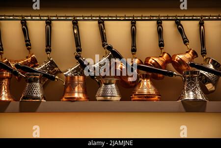 Different types of craft coffee turks in a Turkish shop Stock Photo