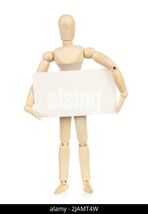 Wooden Manikin holds blank business card on white background close-up Stock Photo
