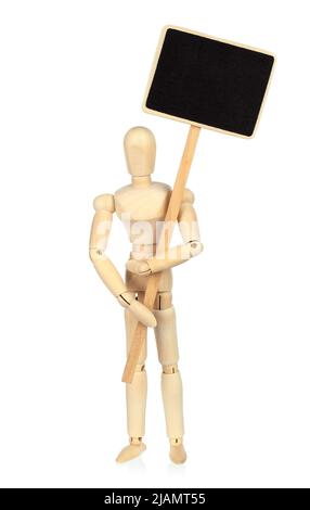 Wooden Manikin holds blank blackboard on white background close-up Stock Photo