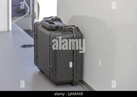 Strong Black Protective Case in Cargo Van Stock Photo