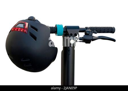 Helmet and handlebars of an electric scooter isolated on a white background Stock Photo