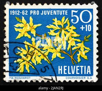 SWITZERLAND - CIRCA 1962: a stamp printed in the Switzerland shows Forsythia, Forsythia Suspensa, Flowering Plant, circa 1962 Stock Photo