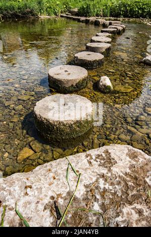 Stepping stones  that are well clear of quiet  water on he River Aire in Gargrave, North Yorkshire, during a drier spell Stock Photo