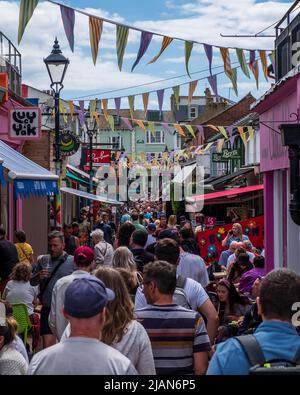 A crowded busy Kensington Gardens in Brighton's popular North Laine on a Saturday Stock Photo