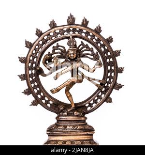 Shiva Dancing Nataraja bronze statuette isolated on white background. Stock Photo