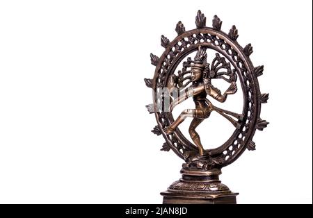 Shiva Dancing Nataraja bronze statuette isolated on white background. Stock Photo
