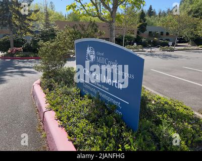 Mill Creek, WA USA - circa May 2022: Angled view of the entrance to Mill Creek City Hall on a bright, sunny day. Stock Photo