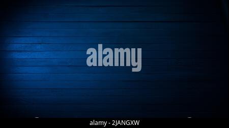Blue wooden table background wood texture. Dark blue rustic plank surface. Panoramic high resolution wood texture. Stock Photo
