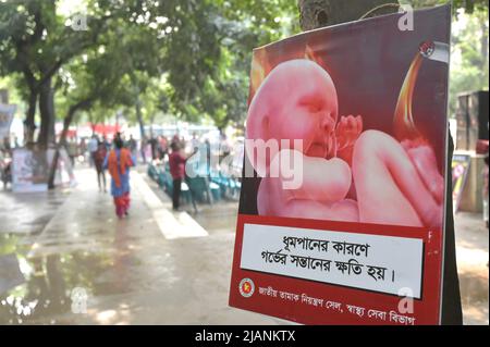 Dhaka. 31st May, 2022. An anti-tobacco awareness poster is displayed during the World No Tobacco Day in Dhaka, Bangladesh, on May 31, 2022. The World No Tobacco Day is observed every year on May 31. This year's theme 'Tobacco: Threat to our environment' gives people one more reason to quit by demonstrating the environmental impacts of tobacco. Credit: Xinhua/Alamy Live News Stock Photo