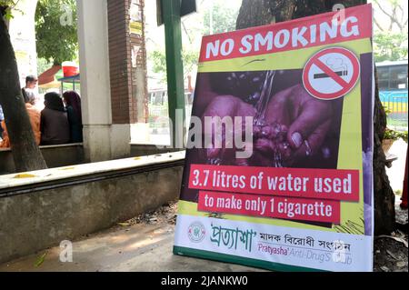 Dhaka. 31st May, 2022. An anti-tobacco awareness poster is displayed during the World No Tobacco Day in Dhaka, Bangladesh, on May 31, 2022. The World No Tobacco Day is observed every year on May 31. This year's theme 'Tobacco: Threat to our environment' gives people one more reason to quit by demonstrating the environmental impacts of tobacco. Credit: Xinhua/Alamy Live News Stock Photo