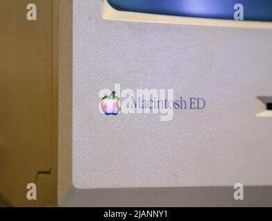 Istanbul, Turkey, March 2019: Closeup old rainbow Apple logo on old Macintosh computer. Rahmi Koc museum Stock Photo