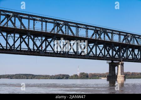 Silhouette of Danube Bridge known as the Friendship Bridge. Steel truss bridge over the Danube River connecting Bulgarian and Romanian banks between R Stock Photo