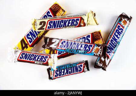 Various flavour of Snickers chochlate bar isolated on white background. Stock Photo