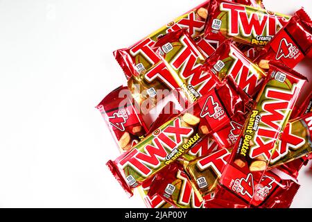 Twix cookies coated with milk chocolate isolated on a white background. Stock Photo