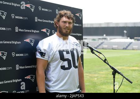 New England Patriots guard Justin Herron (75) stands on the sideline prior  to the second half an NFL football game against the Jacksonville Jaguars,  Sunday, Jan. 2, 2022, in Foxborough, Mass. (AP