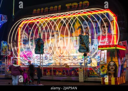 Long exposure of a fairground ride 'Miami Trip' at Seaburn Funfair, Sunderland, UK in October 2016 Stock Photo