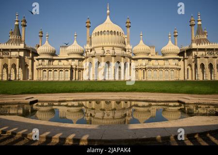 Brighton's Royal Pavilion, Brighton. Brighton, East Sussex, England, UK. Reflection of Royal Pavilion in pond. Indo-Saracenic Revival. Stock Photo