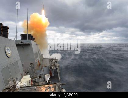 The Arleigh Burke-class guided-missile destroyer USS Laboon (DDG 58) launches an SM-2 missile during a training exercise. Here, USS Laboon is enagged a composite training unit exercise (COMPTUEX) with the Theodore Roosevelt Carrier Strike Group in preparation for an upcoming scheduled deployment.   Optimised version of a U.S. Navy photo. Credit US Navy/M.J.Lieberknecht Stock Photo