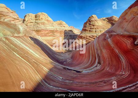 Vermilion Cliffs National Monument. Before highways and railways, before pioneers...the land we know as the United States was a vast wilderness. To protect these last remaining areas, in 1984 Congress created the Paria Canyon - Vermilion Cliffs Wilderness. Coyote Buttes' outstanding scenery, desert wildlife, colourful history, and opportunities for recreation are protected in this landscape for future generations. One of the most beautiful geological formations in the world.  An optimised / enhanced version of a US Bureau of Land Management photo. Credit BLM/B.Wick Stock Photo