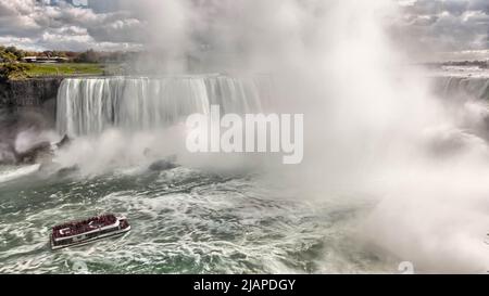The Hornblower ship about to enter the whirlpool below Niagara Falls, Canada Stock Photo