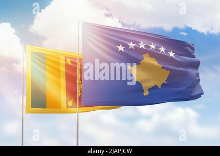 Sunny blue sky and flags of kosovo and sri lanka Stock Photo