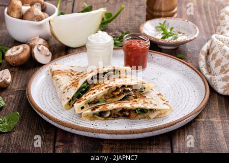 Quesadillas with mushroom, spinach and caramelized onions Stock Photo