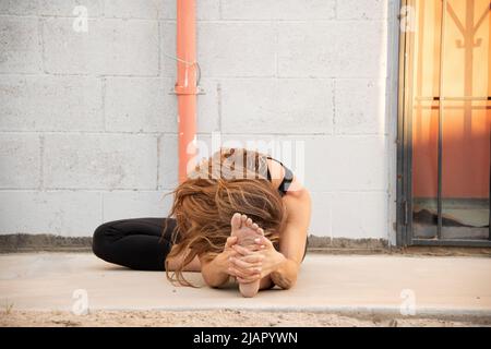 Yoga in a small desert town in California. Stock Photo