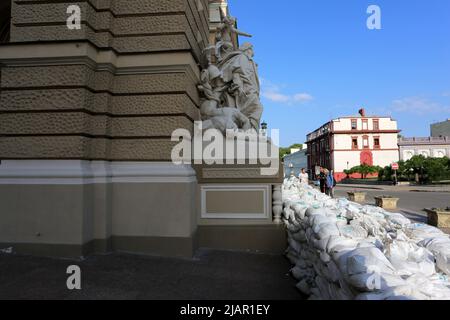 Odessa, Ukraine. 31st May, 2022. Facade of the Odessa State Academic Opera and Ballet Theatre, sandbags are visible. In the center of Odessa during the Russian War against Ukraine, due to possible street fighting, the Ukrainian government erected barricades in the historical center.Due to possible street fighting, following Russian War against Ukraine, the Ukrainian government erected barricades in the historical center of Odessa. Credit: SOPA Images Limited/Alamy Live News Stock Photo