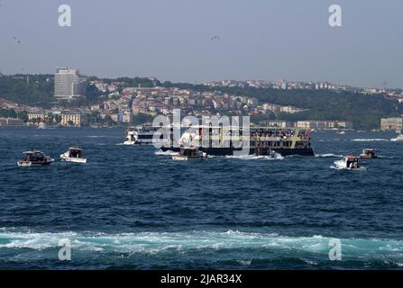 Istanbul, Turkey. 29th May, 2022. Tourists cruise the Bosporus Strait in Istanbul, Turkey, May 29, 2022. Credit: Shadati/Xinhua/Alamy Live News Stock Photo