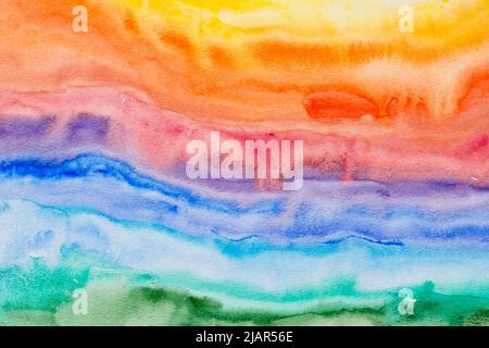 rainbow colors watercolor painted on paper background texture Stock Photo