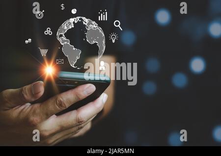 Businessman using mobile phone. Businessman using global internet, digital marketing, finance and investment. Finding information and big data. Stock Photo