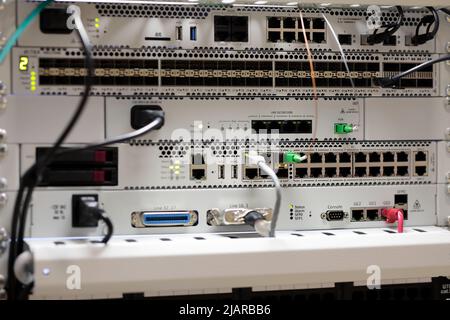 Close up of modern telecommunication equipment in a rack. Selective focus. Stock Photo