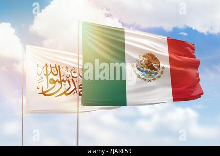 Sunny blue sky and flags of mexico and afghanistan Stock Photo