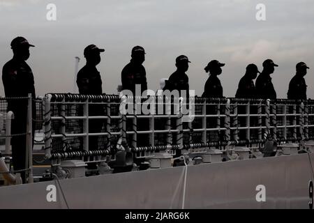 Manila, Philippines. 1st June, 2022. Filipino sailors stand on deck manning the rail as they prepare to dock BRP Melchora Aquino at Manila's port area, Philippines. June 1, 2022. The brand new multi-role vessel built by Japan was ordered by the Philippine Coast Guard to strengthen its maritime security, safety and marine environmental protection capabilities in the country's waters, especially in the disputed South China Sea where the Philippines continues to have tense territorial standoffs with China. (Credit Image: © Basilio Sepe/ZUMA Press Wire) Stock Photo