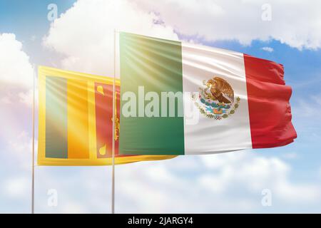 Sunny blue sky and flags of mexico and sri lanka Stock Photo