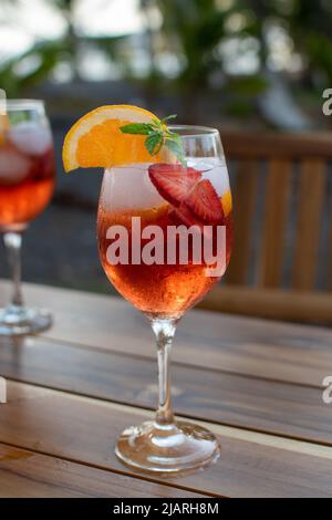 Strawberry sangria with lemon and orange cocktail ice fresh Stock Photo