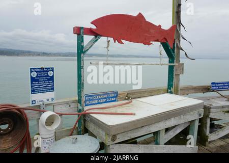 Fish cleaning station on the pier at Capitola, California Stock Photo