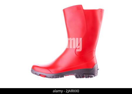 Red rubber boots isolated on white background. Outdoor shoes for trekking. Stock Photo