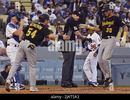 August 10, 2022: Tucupita Marcano (30) of the Pittsburgh Pirates scores on  a double steal in the top of the fourth inning taking the lead 3-0 between  the Pittsburgh Pirates and the