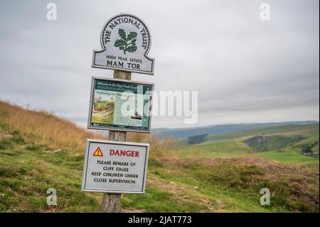 Mam Tor, National Trust sign, indicating to walkers where they are and explaining about the landscape.  The location is the Peak Districk, England Stock Photo