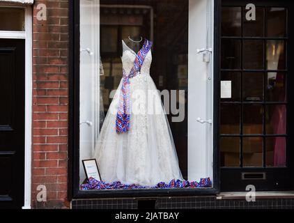 Brighton UK 1st June 2022 - Shops in Rottingdean village near Brighton are ready for the Queen's Platinum Jubilee Celebrations over the next few days : Credit Simon Dack / Alamy Live News