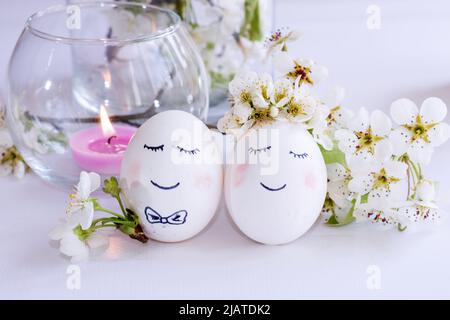 Easter painted eggs isolated on trendy blue background. The minimum concept of Easter. Easter card with copy space for text. Stock Photo