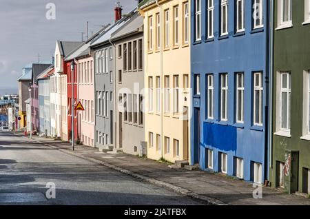 Reykjavik, Iceland, April 25, 2022: street in the old center of town with individual facades painted in various colors Stock Photo