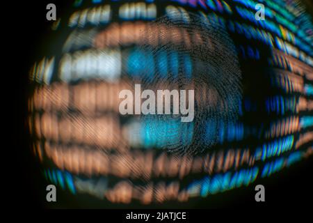 Nice fingerprint on the crumpled background of the code. Abstract computer script code. Software developer code. Stock Photo