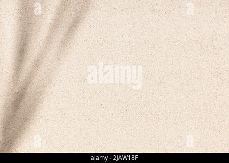 Beach Sand background texture with leaves shadow. Flat Sandy beach. Top view Stock Photo