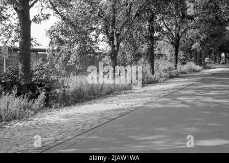 The East German border at Staaken between East and West Berlin in 1989 Stock Photo